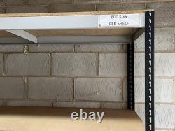 Heavy duty commercial-grade racking. 600kg Per shelf. Used