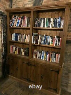 Large solid pine bookcase with antique finish in excellent condition