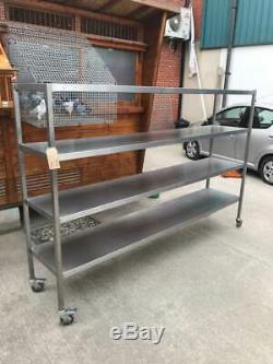 Stainless steel 4 tier/ shelf/ rack heavy duty on braked castors 2360mm x 500mm