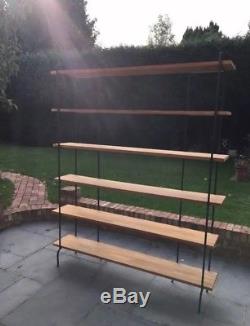 Wood shelves supported on metal sides free standing Habitat brand